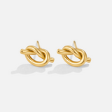 Margaux – Gold earrings in a braided shape.